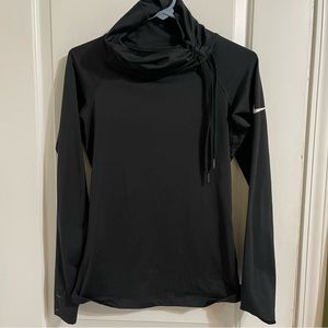 Black Nike women’s top. Adjustable turtle neck